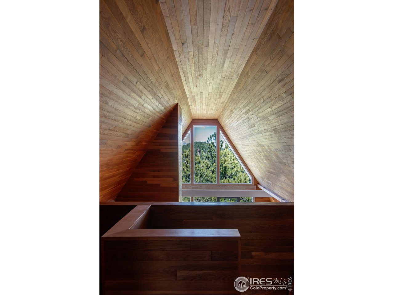 65 Bristlecone Way Boulder, CO 80304 - Photo 30 of 49 a picture of a bench in front of a house