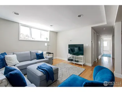 a view of a livingroom with furniture and a couch