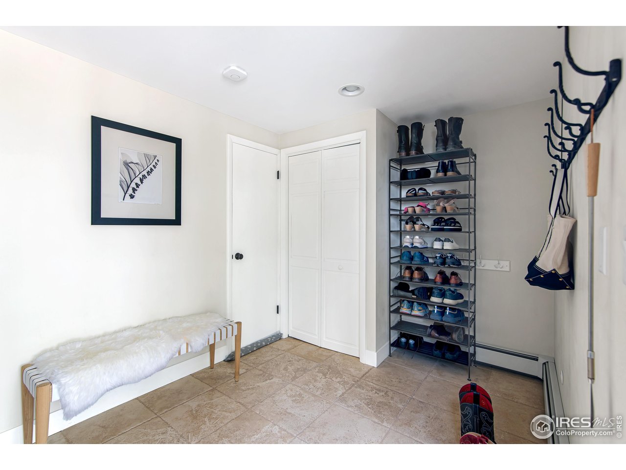 65 Bristlecone Way Boulder, CO 80304 - Photo 39 of 49 a room with a walk in closet and a window