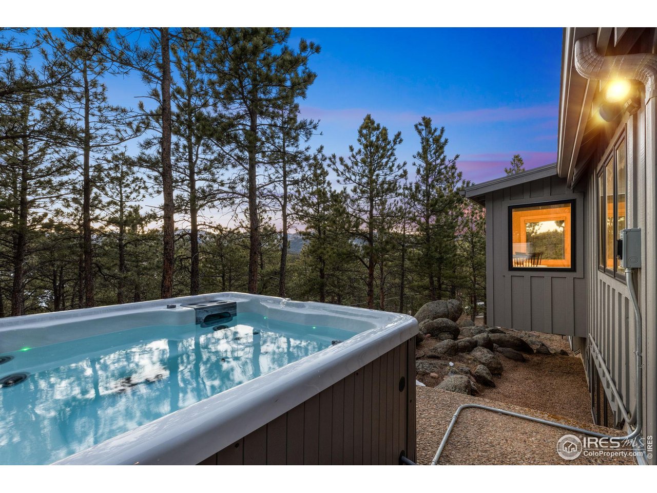 65 Bristlecone Way Boulder, CO 80304 - Photo 4 of 49 a view of a couches with sky view
