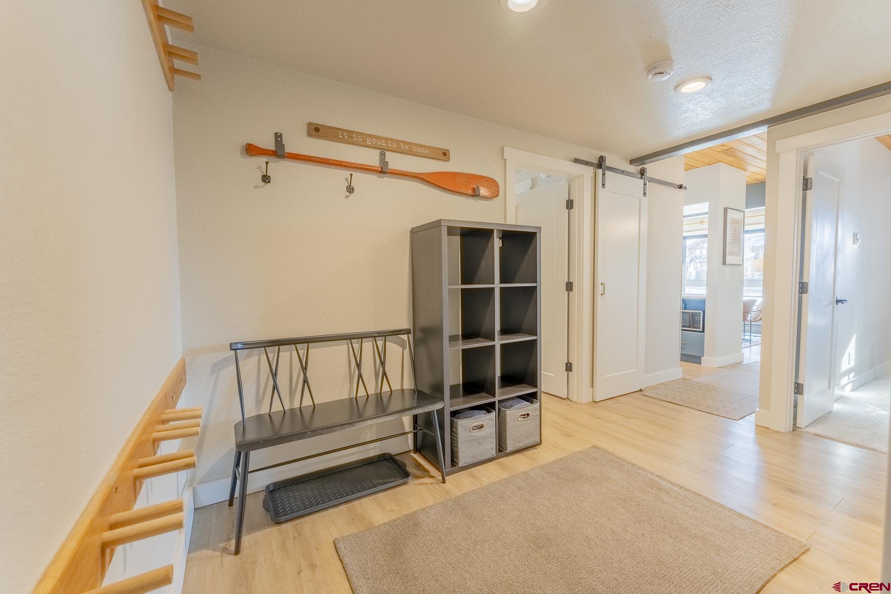 400 Gothic Road, Unit 207 Crested Butte, CO 81225 - Photo 24 of 35 a view of staircase with white walls and a window