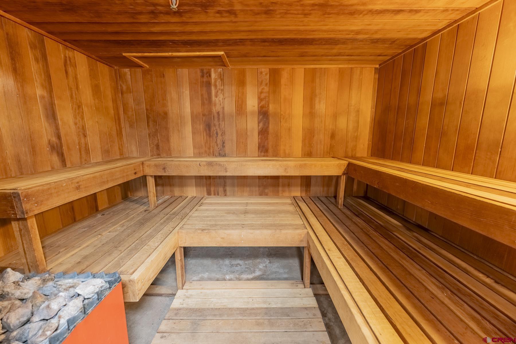 400 Gothic Road, Unit 207 Crested Butte, CO 81225 - Photo 28 of 35 a view of a balcony with wooden floor and bench