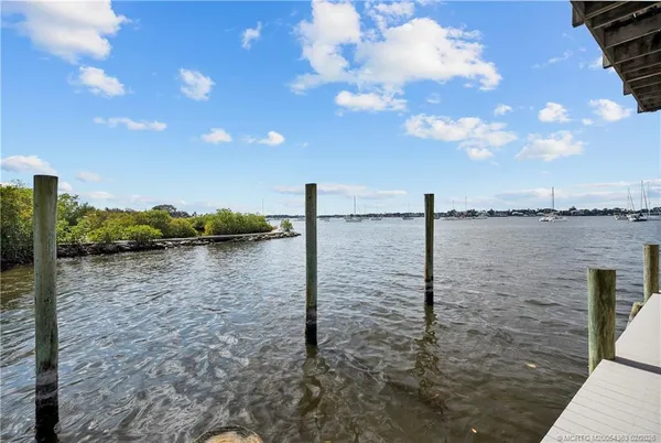a view of a balcony with an ocean view