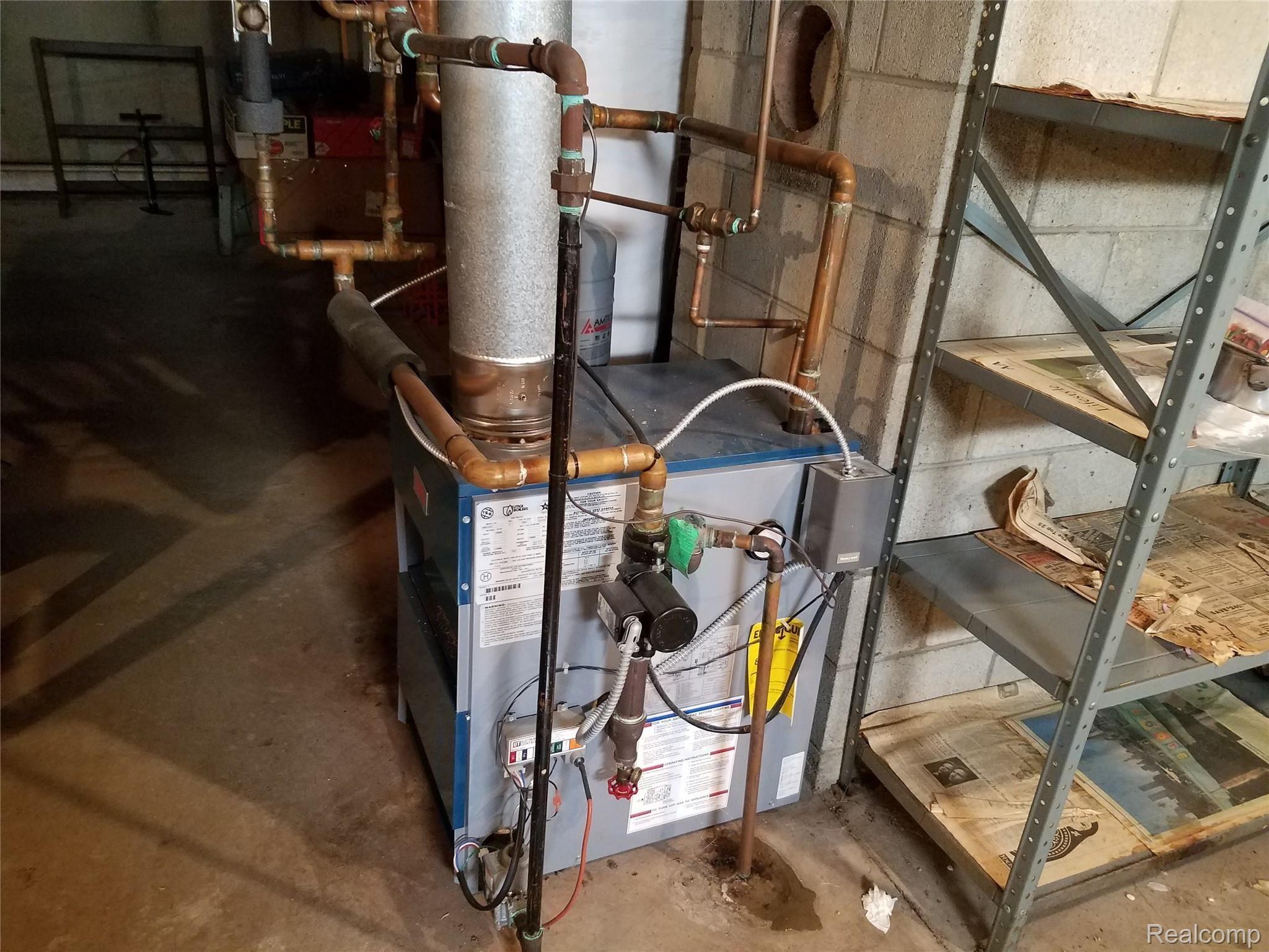 3638 Innisfree Road Howell, MI 48855 - Photo 30 of 45 Basement boiler & HWH.jpg