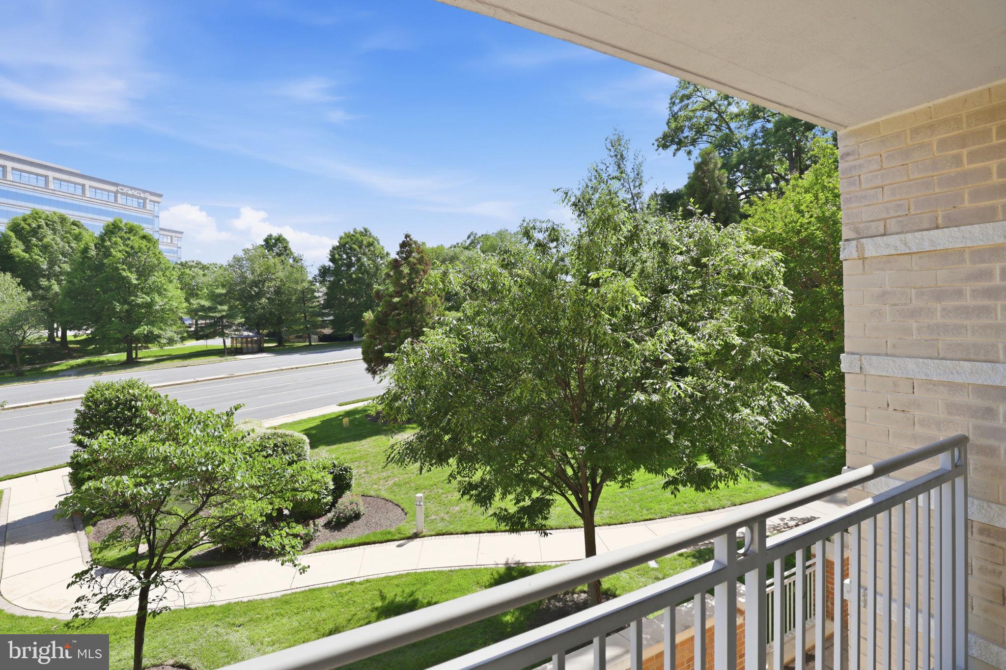 11800 Sunset Hills Road, Unit 218 Reston, VA 20190 - Photo 3 of 38 a view of a garden from a balcony