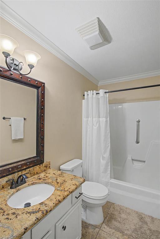 10056 Alondra Street Shreveport, LA 71115 - Photo 19 of 31 a bathroom with a granite countertop sink toilet and shower