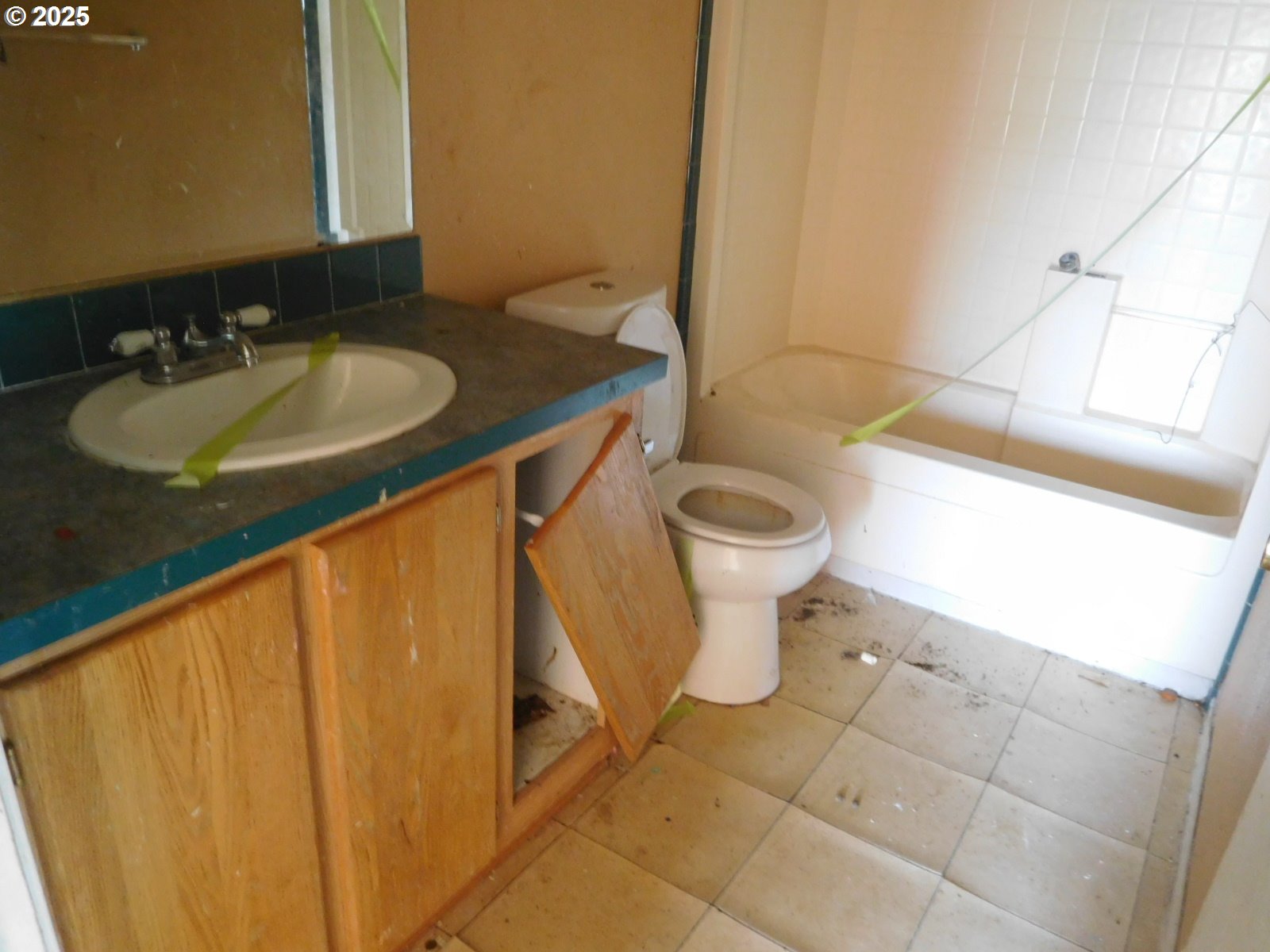 595 South E 13th Irrigon, OR 97844 - Photo 18 of 31 a bathroom with a granite countertop sink and a mirror
