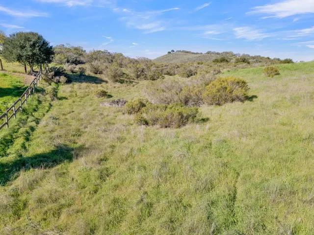 a view of a lake with mountains in the background