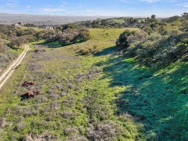 a view of an ocean and mountain