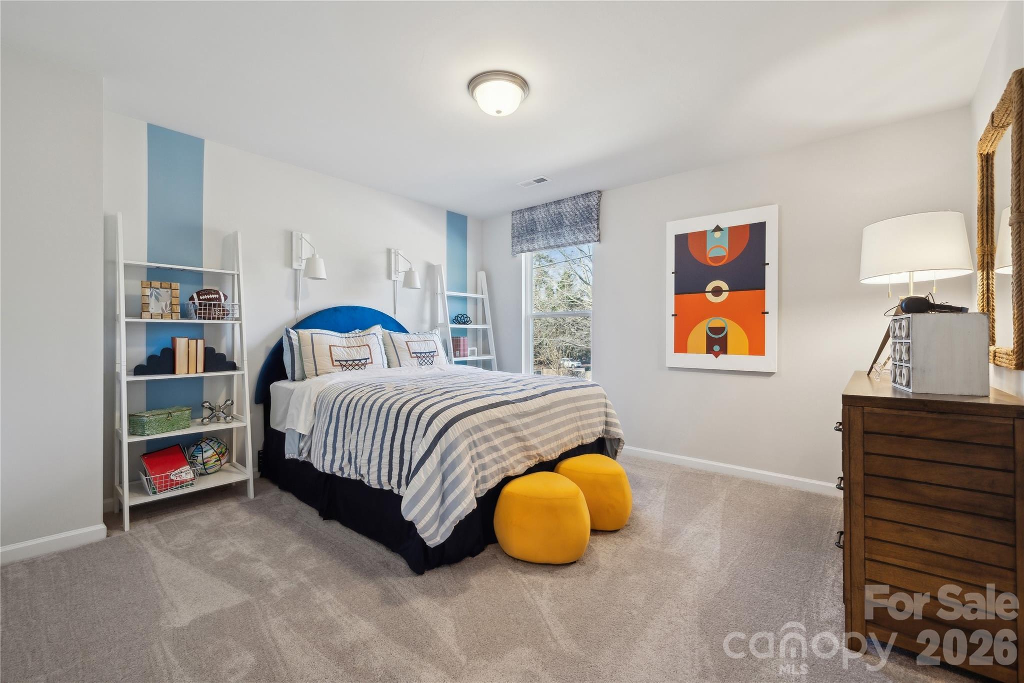 108 Coronado Avenue Matthews, NC 28104 - Photo 11 of 38 a bedroom with a bed and painting on the wall