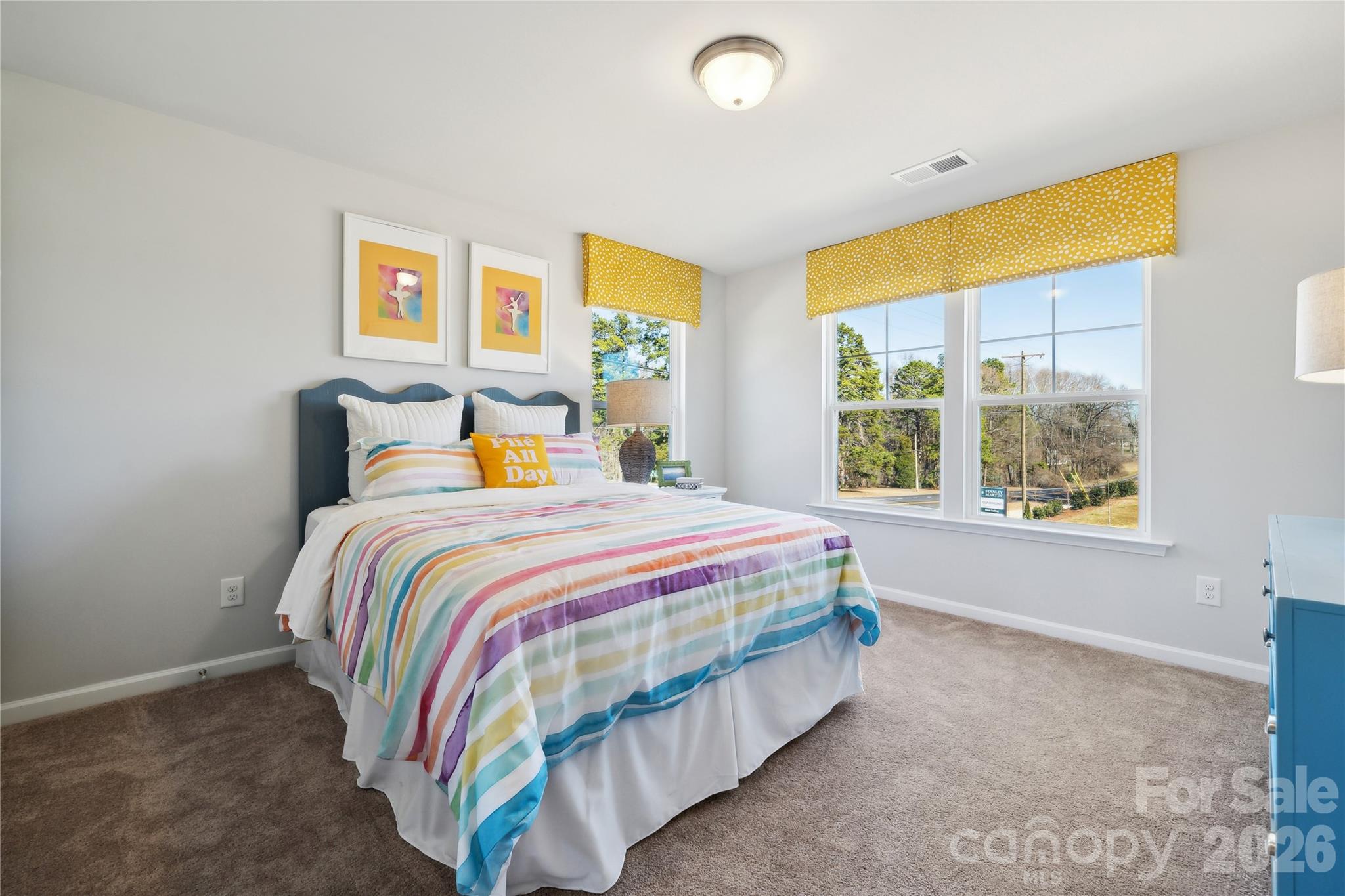 108 Coronado Avenue Matthews, NC 28104 - Photo 13 of 38 a bedroom with a bed and window