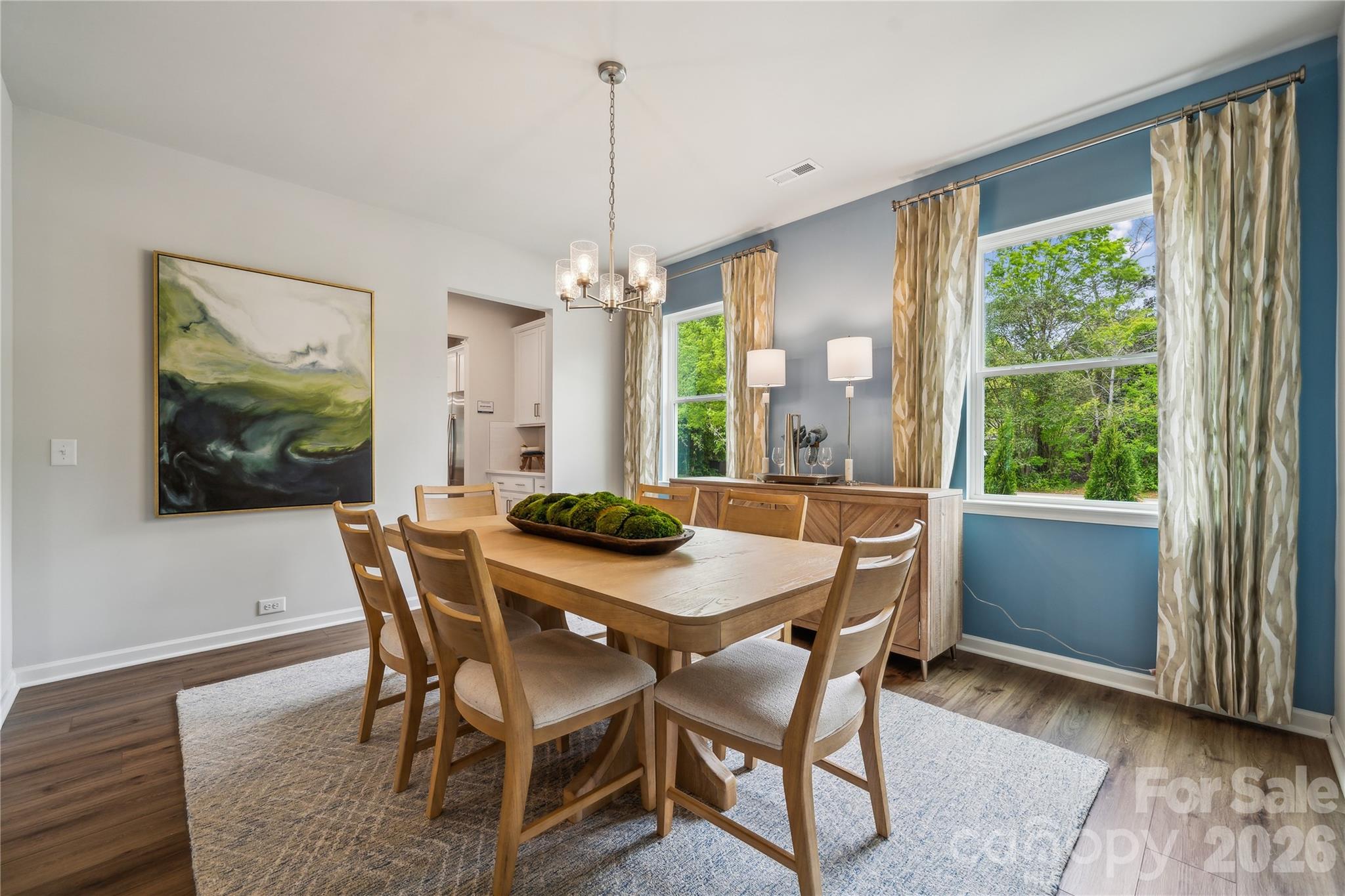 108 Coronado Avenue Matthews, NC 28104 - Photo 21 of 38 a view of a dining room with furniture window and outside view