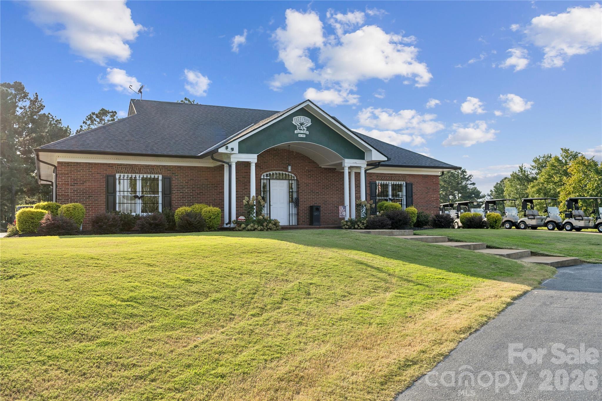 108 Coronado Avenue Matthews, NC 28104 - Photo 36 of 38 a front view of a house with garden