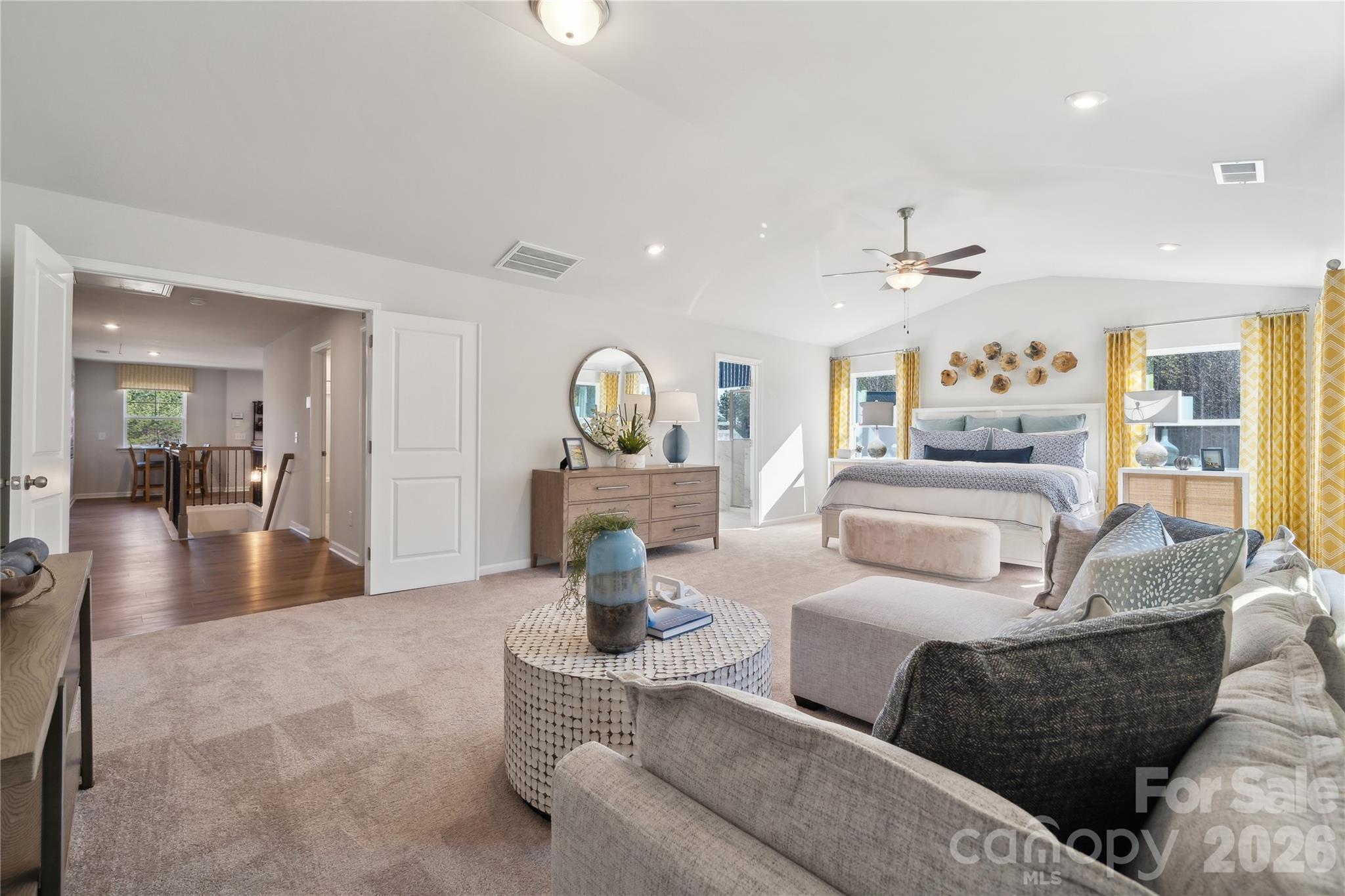 108 Coronado Avenue Matthews, NC 28104 - Photo 4 of 38 a living room with furniture and a dining table