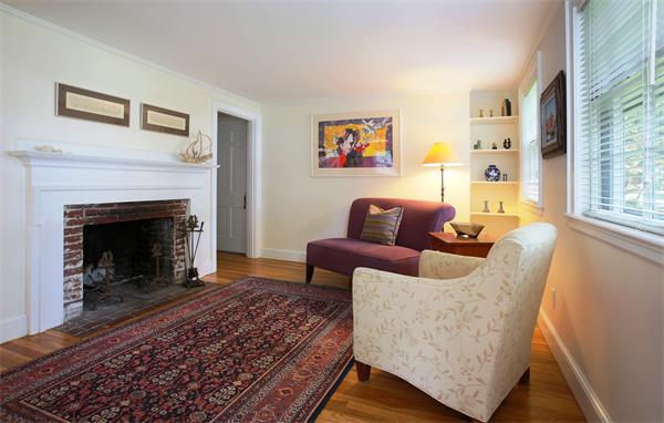 30 Bay View Road Wellesley, MA 02482 - Photo 4 of 8 a living room with furniture and a fireplace