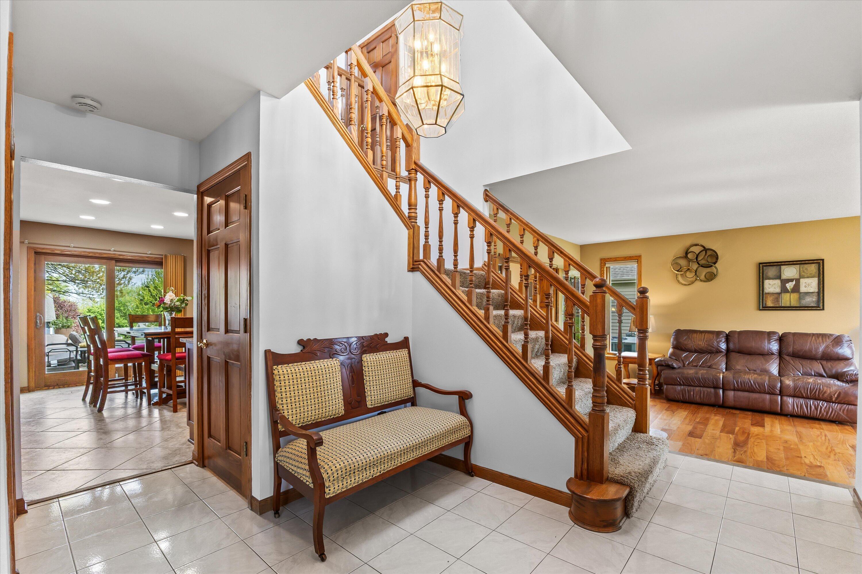 W168N5140 Stonefield Road Menomonee Falls, WI 53051 - Photo 13 of 49 Spacious foyer opens to inviting spaces