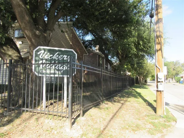 a view of a entrance gate of a house