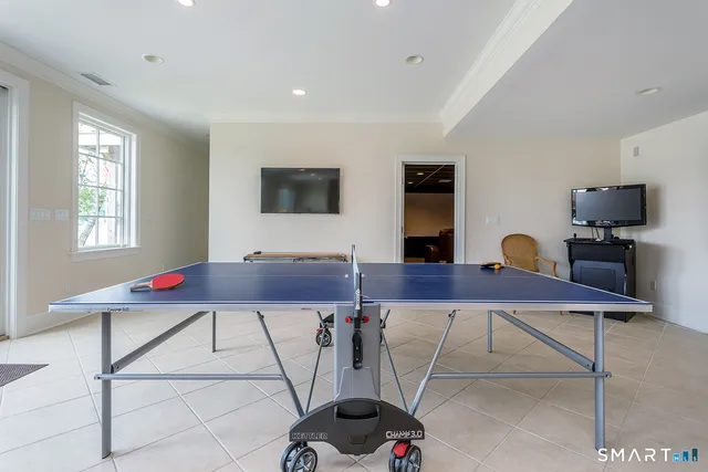 a kitchen with stainless steel appliances granite countertop a stove and a refrigerator