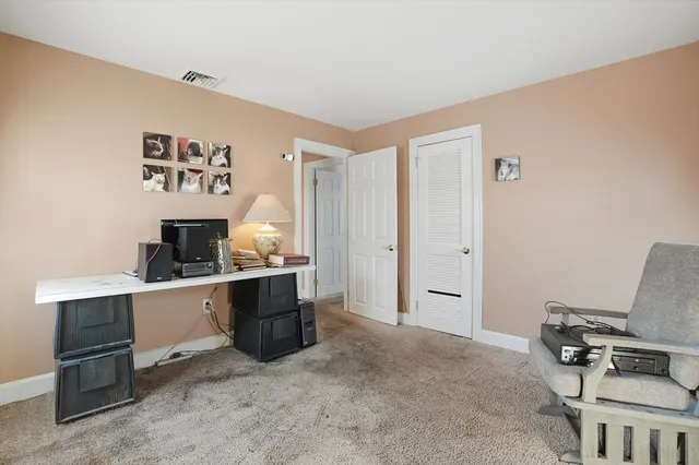 a room with furniture and window