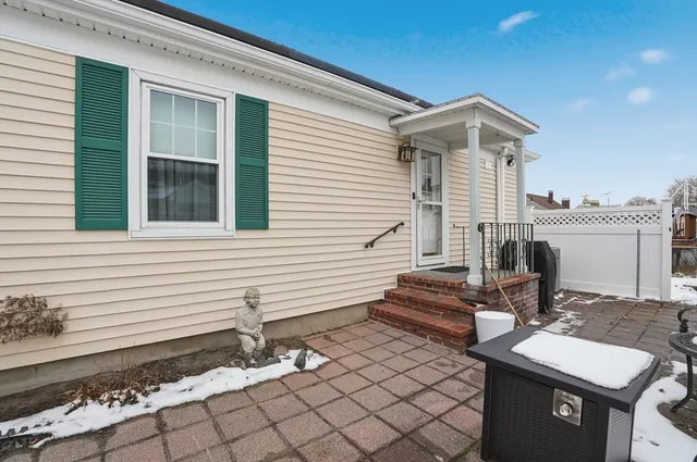 a view of a terrace with sitting area