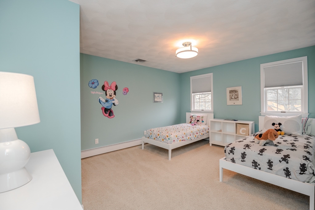 25 Ellen Road Stoneham, MA 02180 - Photo 23 of 41 a bedroom with bed and window