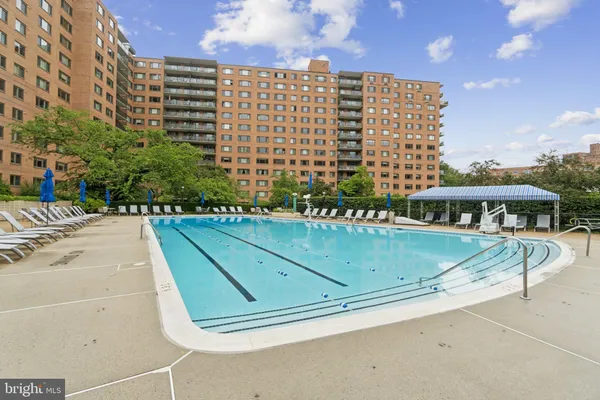a view of outdoor space with swimming pool and patio