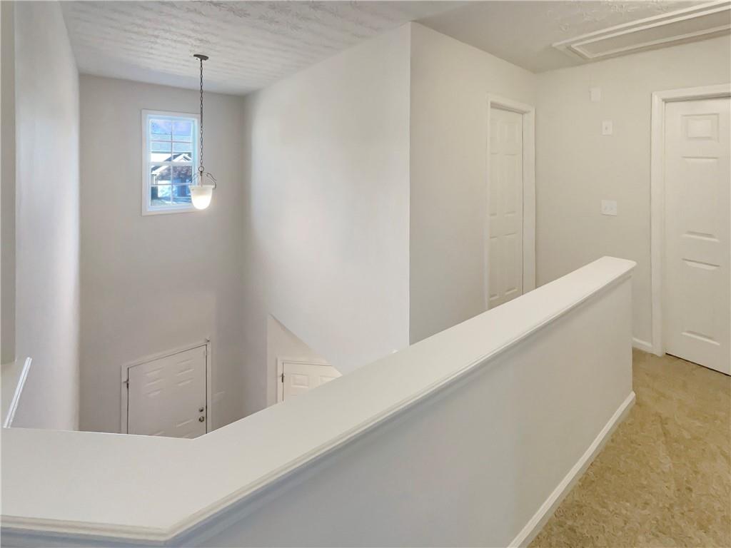 11569 Kades Trail Hampton, GA 30228 - Photo 12 of 25 a view of a hallway with window