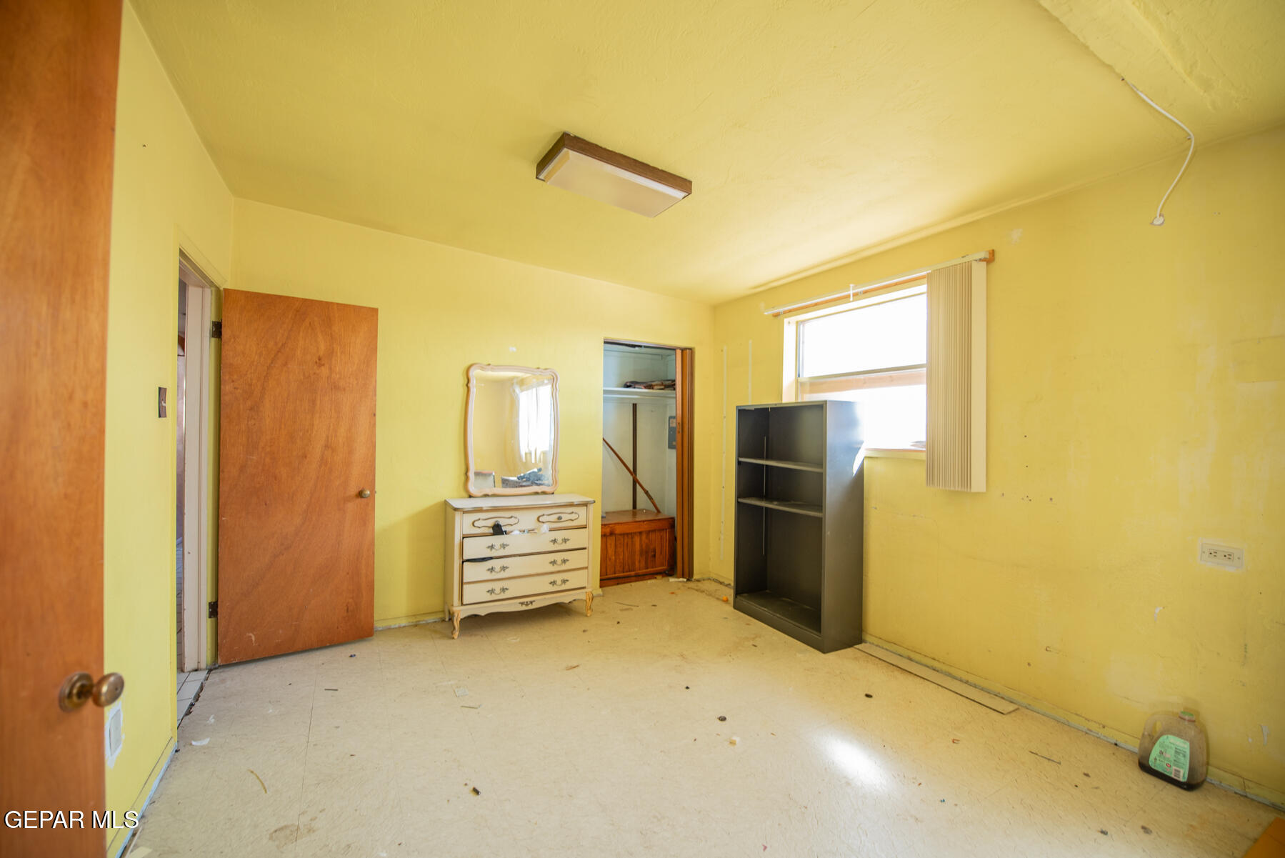 6240 Papago Road El Paso, TX 79905 - Photo 10 of 12 a view of a kitchen with refrigerator and cabinet