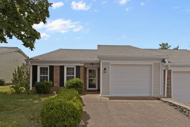 front view of house with a yard