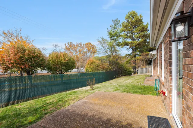 a backyard of a house with seating space