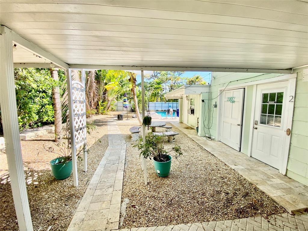 1310 Northeast 30th Street, Unit 4 Fort Lauderdale, FL 33334 - Photo 23 of 24 a lobby with furniture and a potted plant