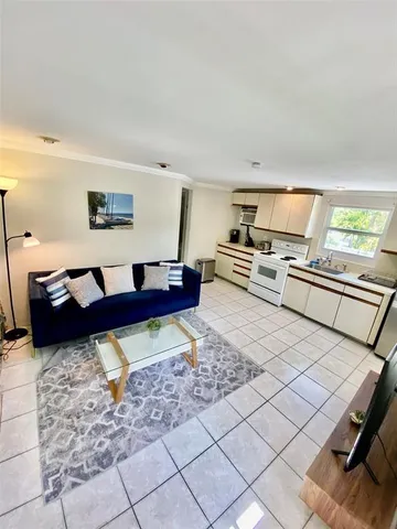 a living room with a couch and a coffee table