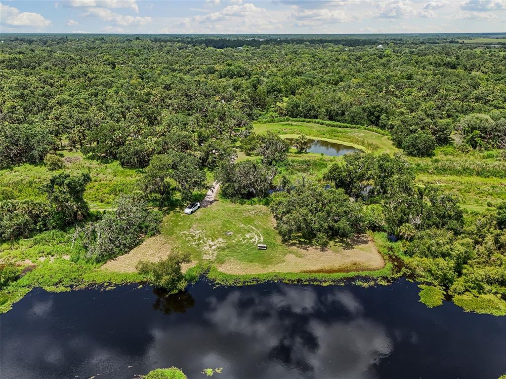 0 Hidden River Road Sarasota, FL 34240 - Photo 14 of 18 a view of a yard with a yard