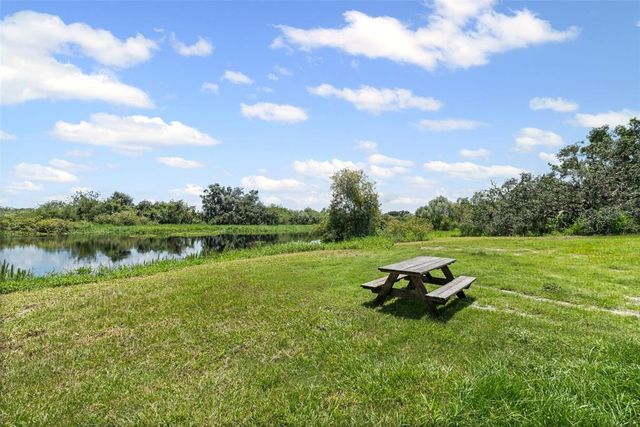 a lake view with a garden