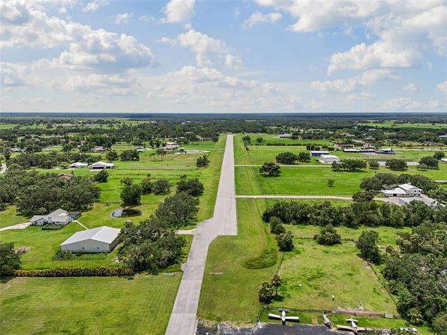 a view of a lush green field