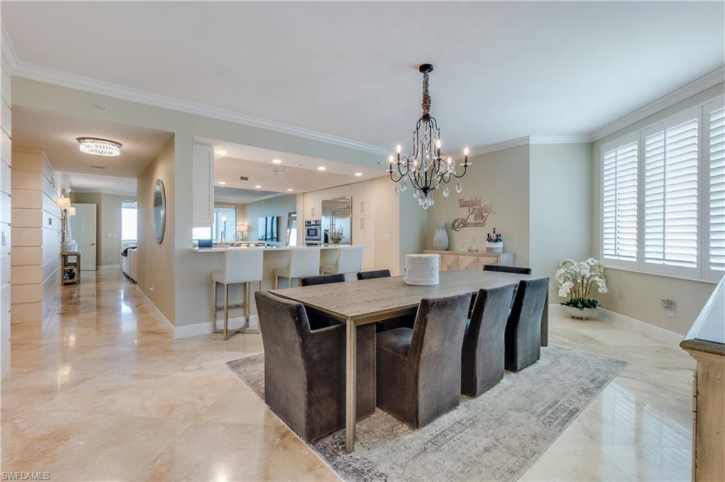 275 Indies Way, Unit 1002 Naples, FL 34110 - Photo 7 of 48 Dining room featuring a wealth of natural light