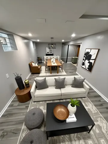 a living room with furniture and rug