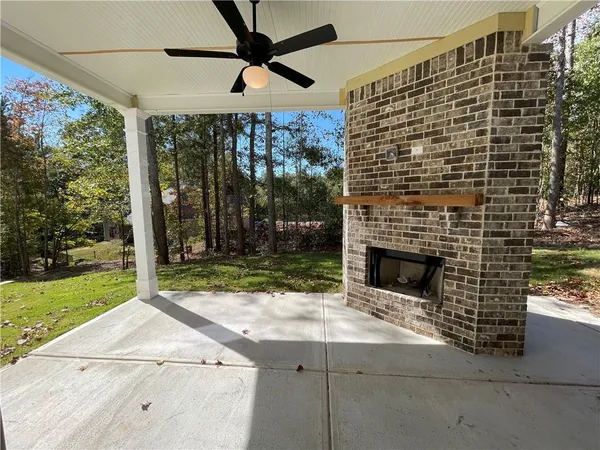 a view of open kitchen with a sink and garden view