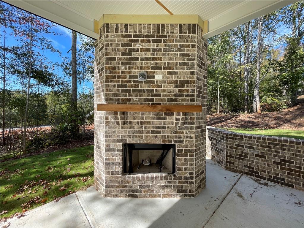 3838 Cheyenne Lane Jefferson, GA 30549 - Photo 15 of 29 a front view of a house with a garden