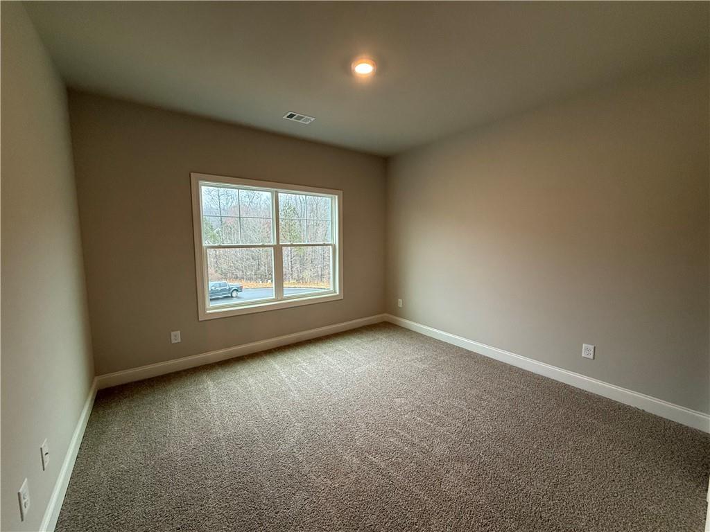 3838 Cheyenne Lane Jefferson, GA 30549 - Photo 25 of 29 an empty room with windows