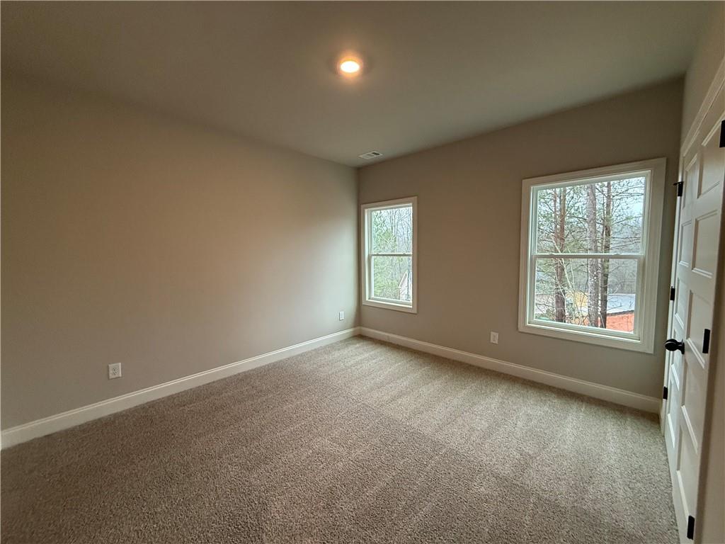 3838 Cheyenne Lane Jefferson, GA 30549 - Photo 29 of 29 an empty room with windows
