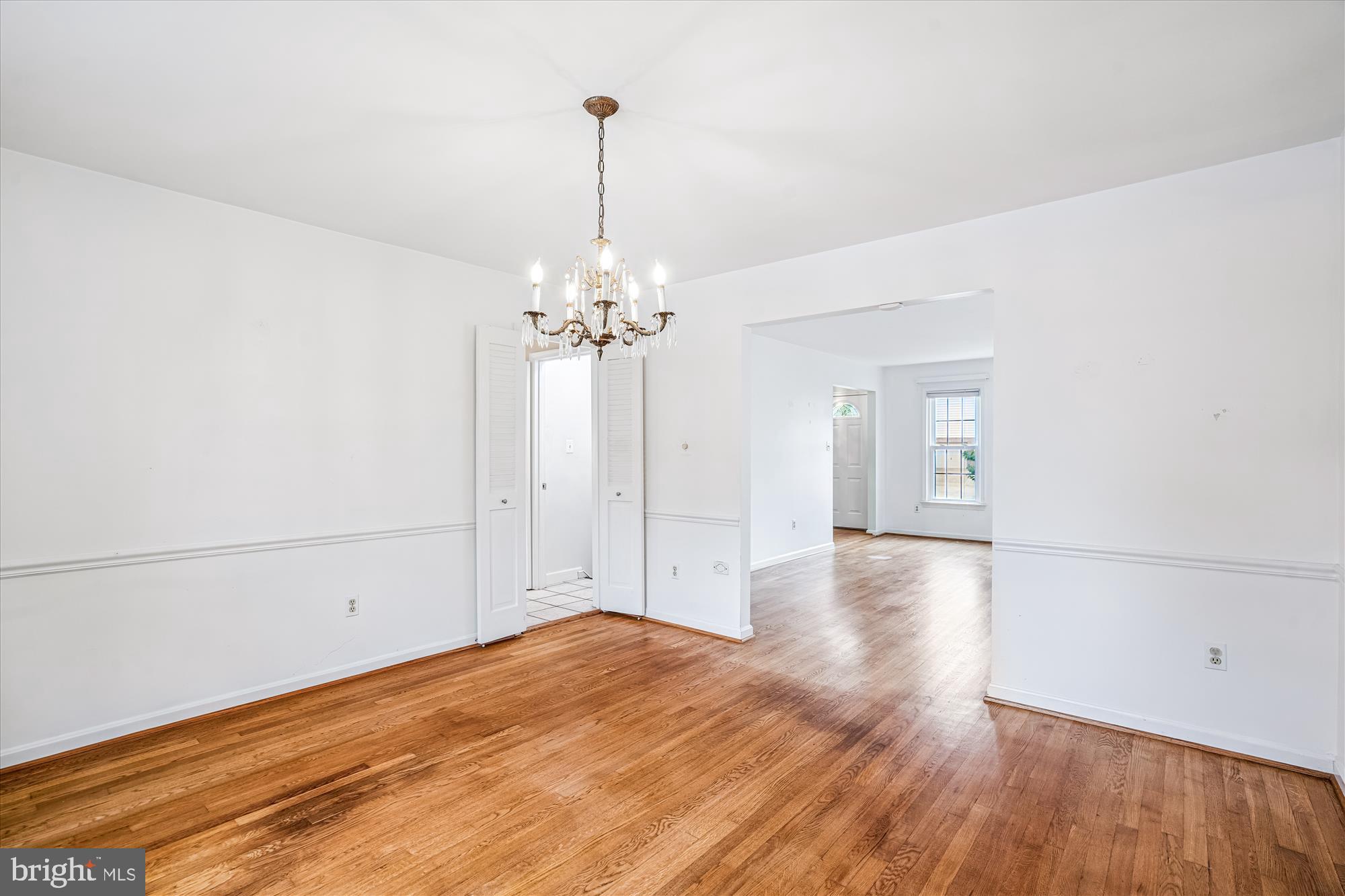 1913 Hopefield Road Silver Spring, MD 20905 - Photo 15 of 67 wooden floor in an empty room with a window