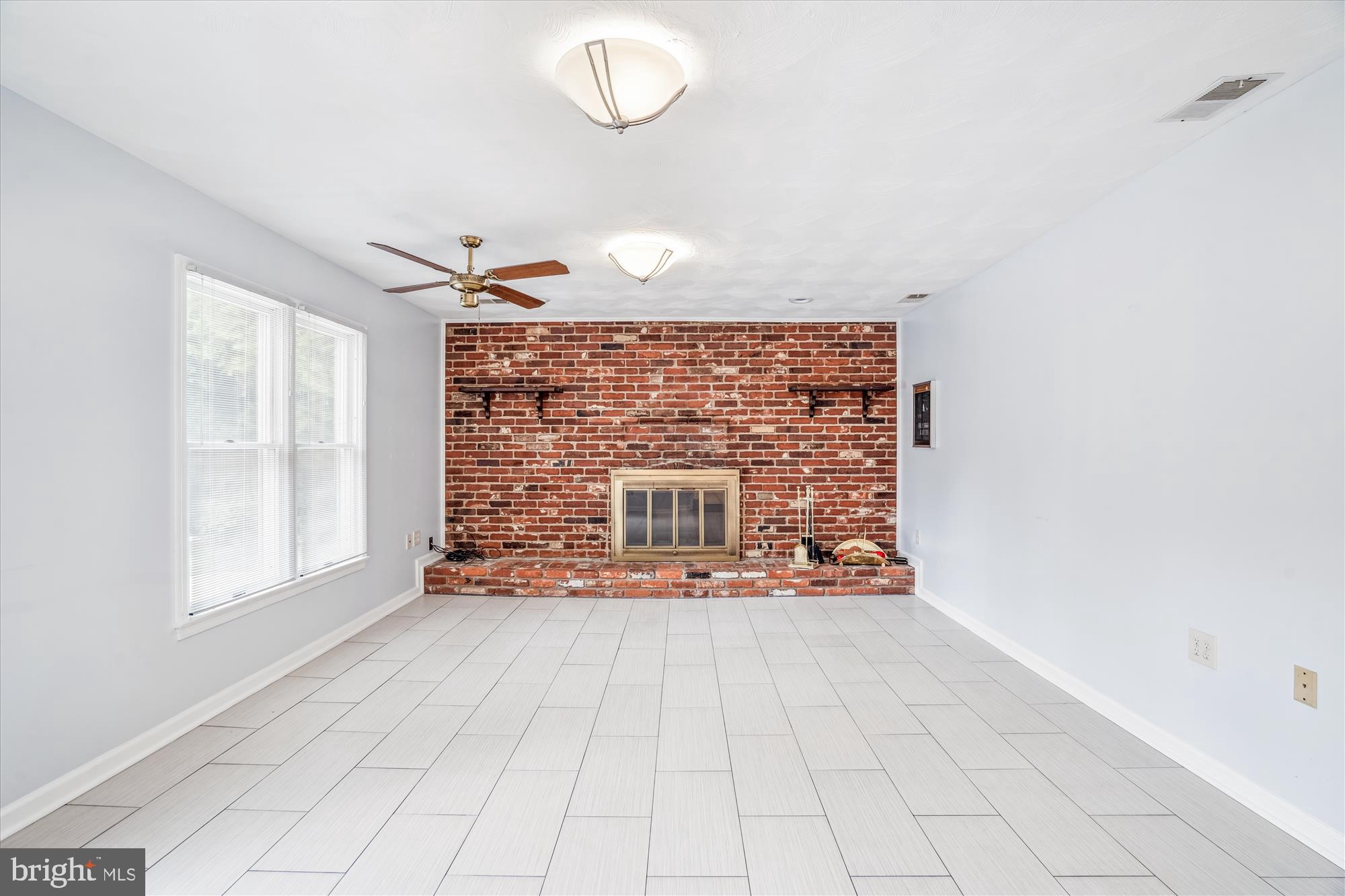 1913 Hopefield Road Silver Spring, MD 20905 - Photo 27 of 67 a view of an empty room with a window