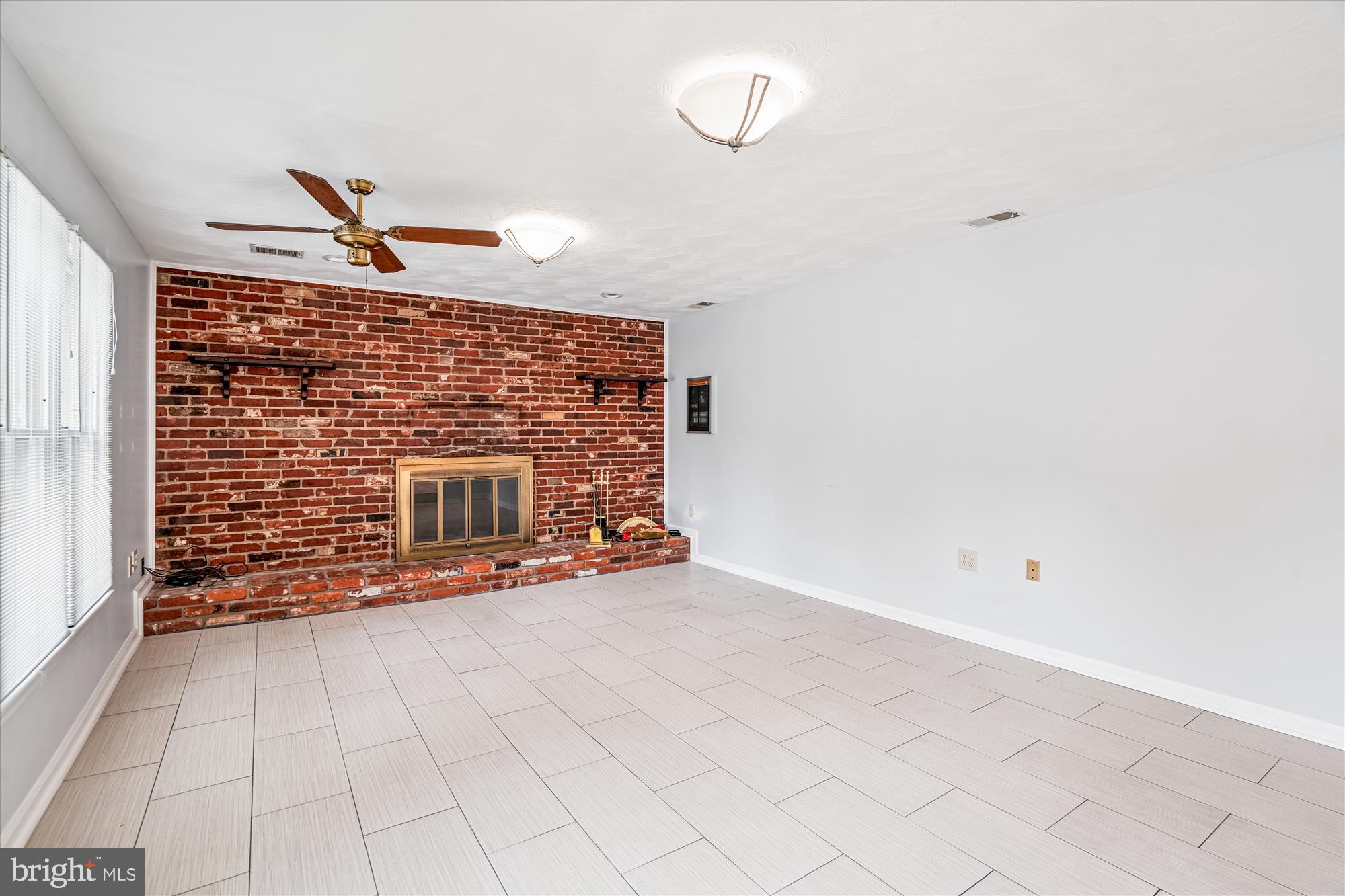 1913 Hopefield Road Silver Spring, MD 20905 - Photo 28 of 67 a view of an empty room with windows