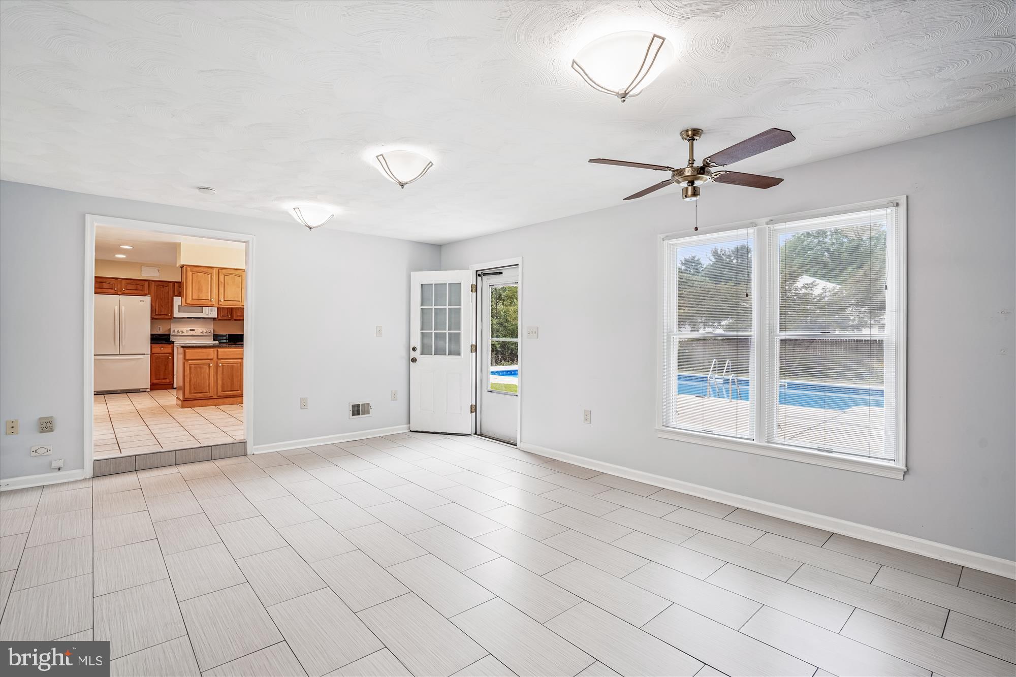 1913 Hopefield Road Silver Spring, MD 20905 - Photo 30 of 67 a view of an empty room with a window