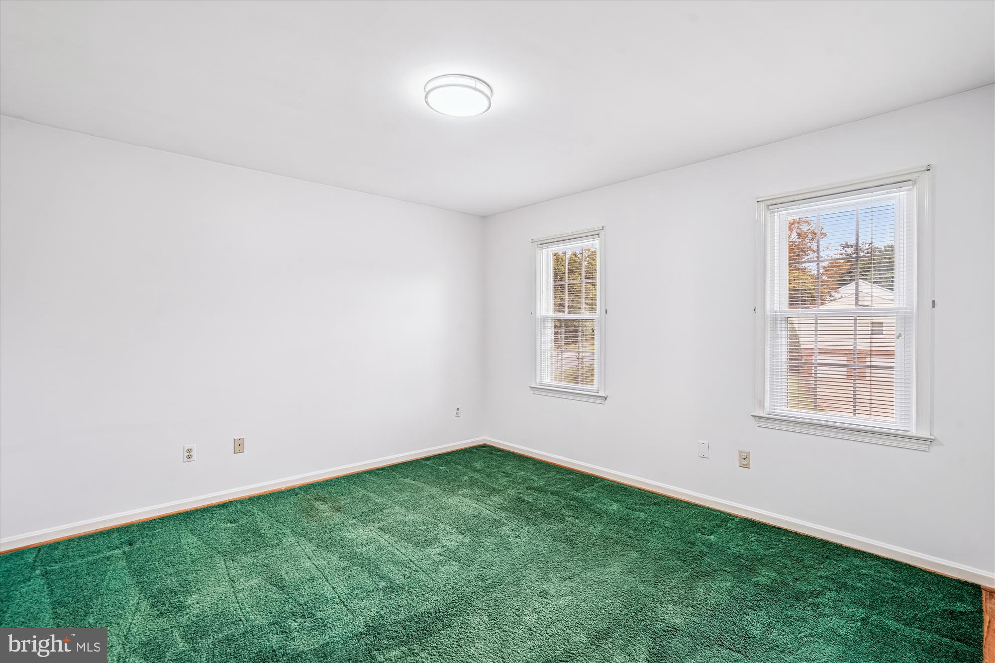 1913 Hopefield Road Silver Spring, MD 20905 - Photo 45 of 67 a view of an empty room with a window