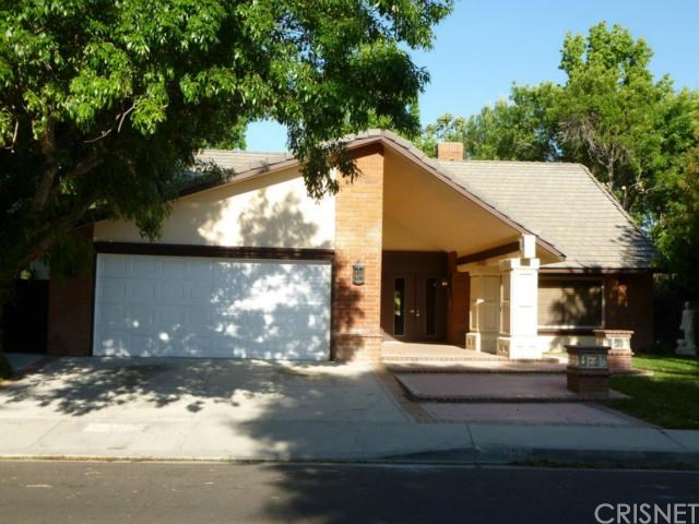 23708 Rotunda Road Valencia, CA 91355 - Photo 1 of 1 a view of a house with a yard