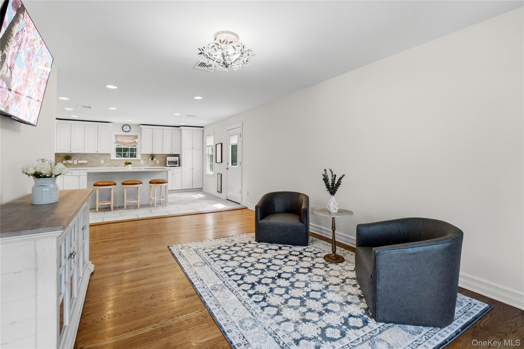 47 Syosset Circle Syosset, NY 11791 - Photo 15 of 30 a large white kitchen with a large window