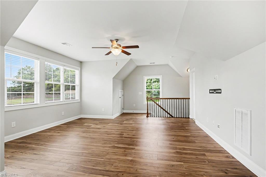 7105 Lambert Lake Road Stokesdale, NC 27357 - Photo 28 of 48 Bonus Room--Stairs off of Breakfast Area