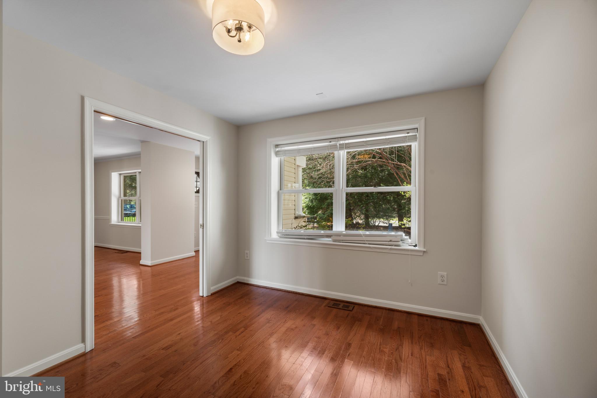 5929 Deale Beach Road Deale, MD 20751 - Photo 24 of 58 Unfurnished room featuring dark wood-style floors